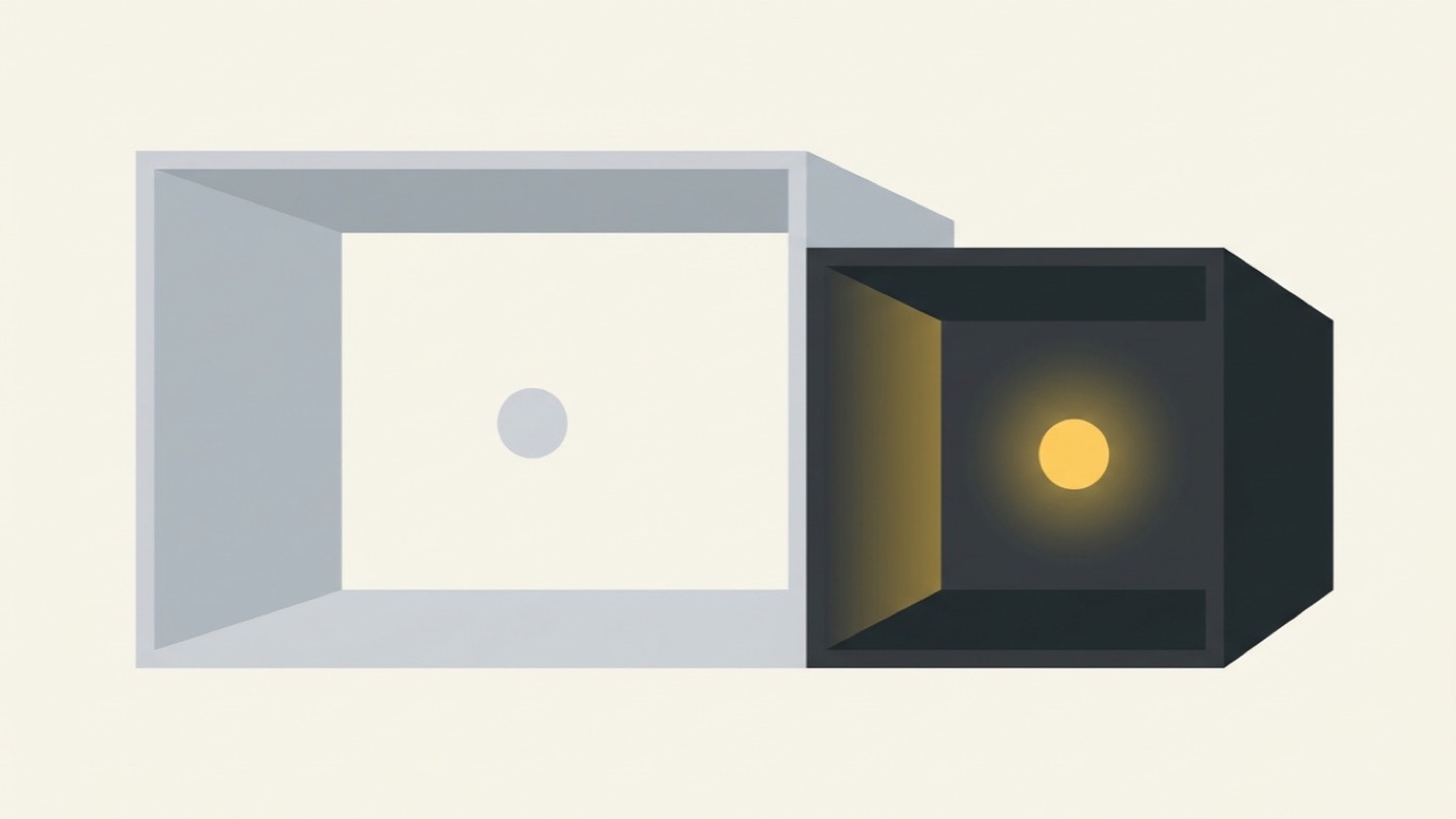 Two open box forms on a warm off-white ground. The large pale grey box holds a small dull grey dot that lights nothing. The smaller charcoal box holds a glowing yellow dot that lights its interior walls.
