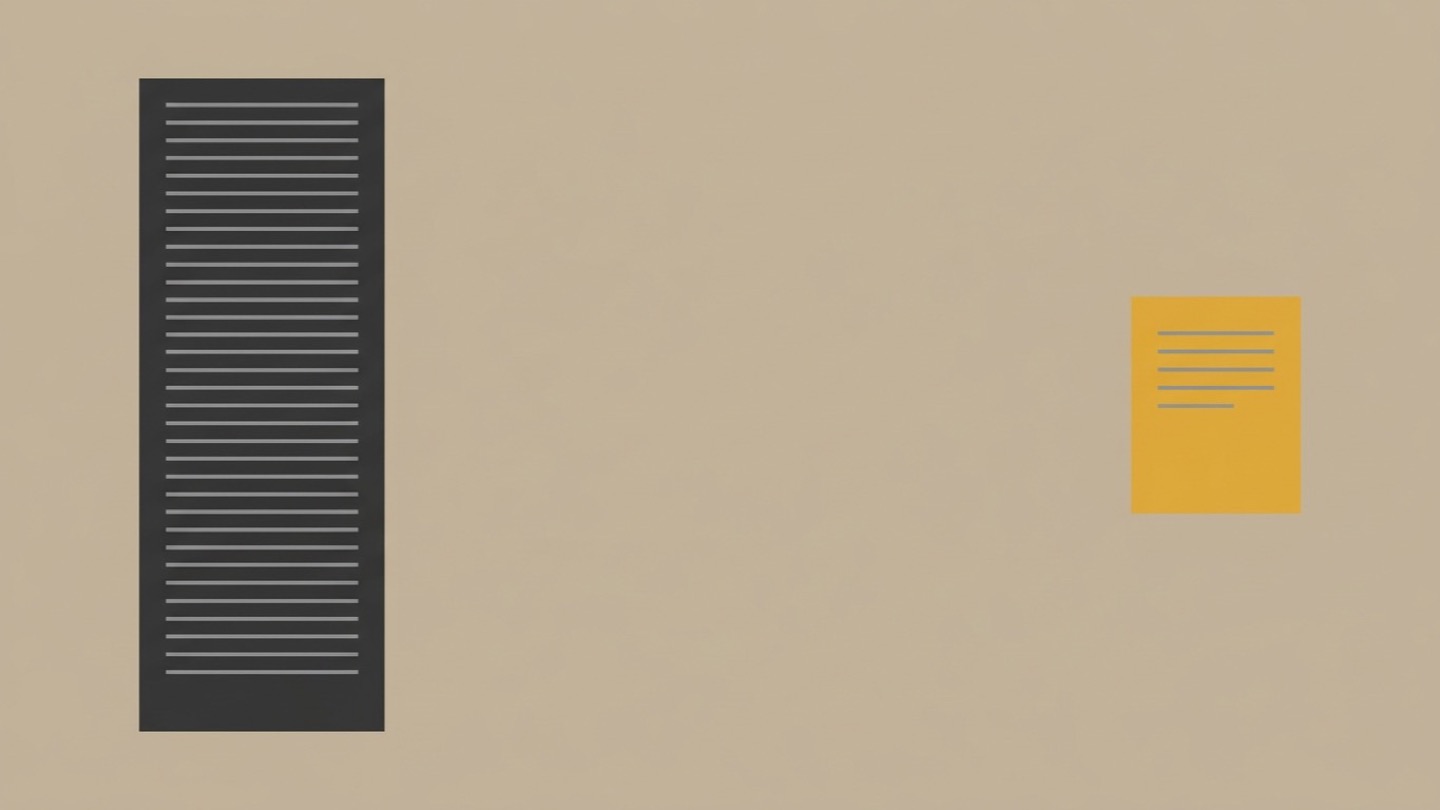 A tall dense charcoal document filled with dozens of lines of text beside one small gold card carrying just four short lines